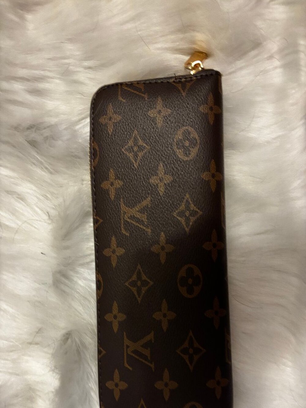 L. V.  Wallet